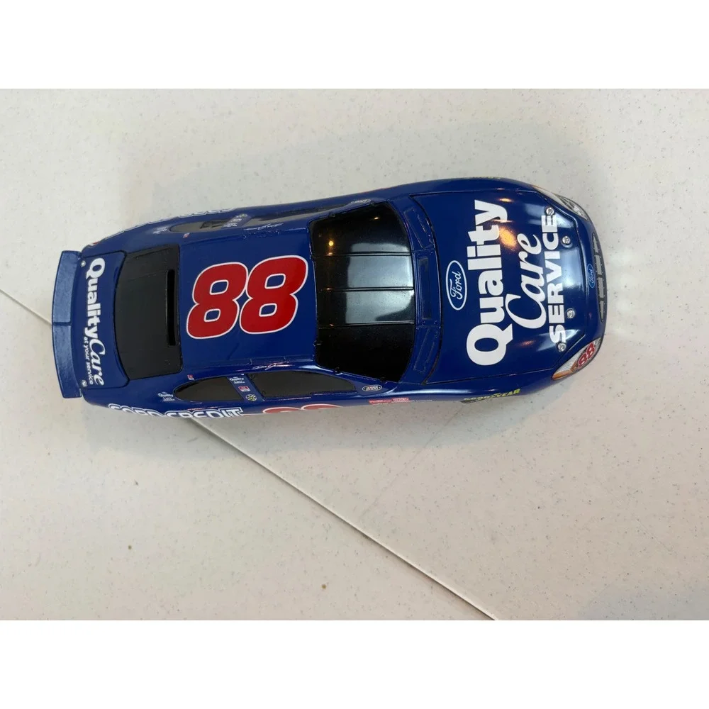 Dale Jarrett 88 Ford Quality Care Credit Taurus NASCAR 1:24 Diecast Car Blue